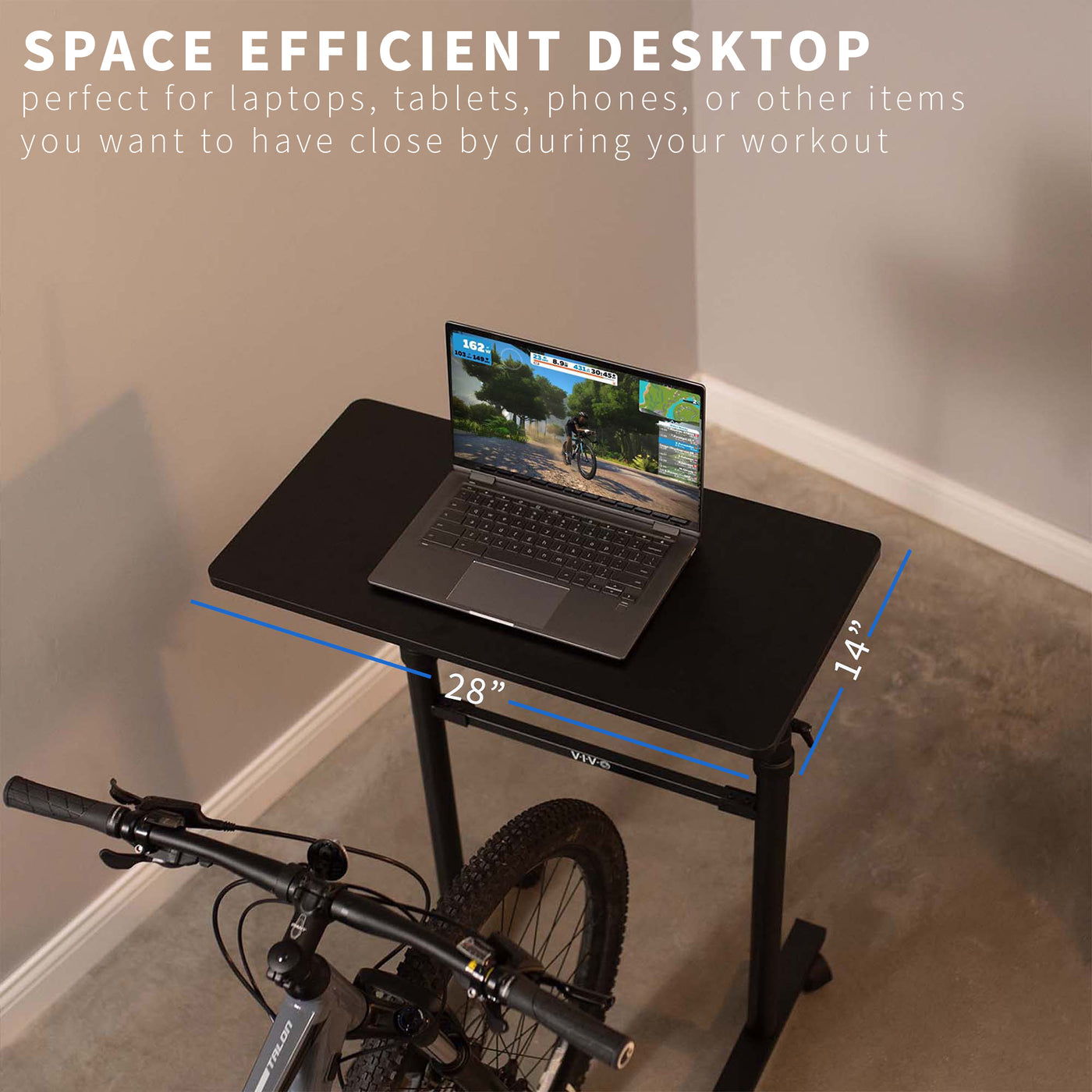Space efficient height adjustable stationary exercise bike workstation desktop.