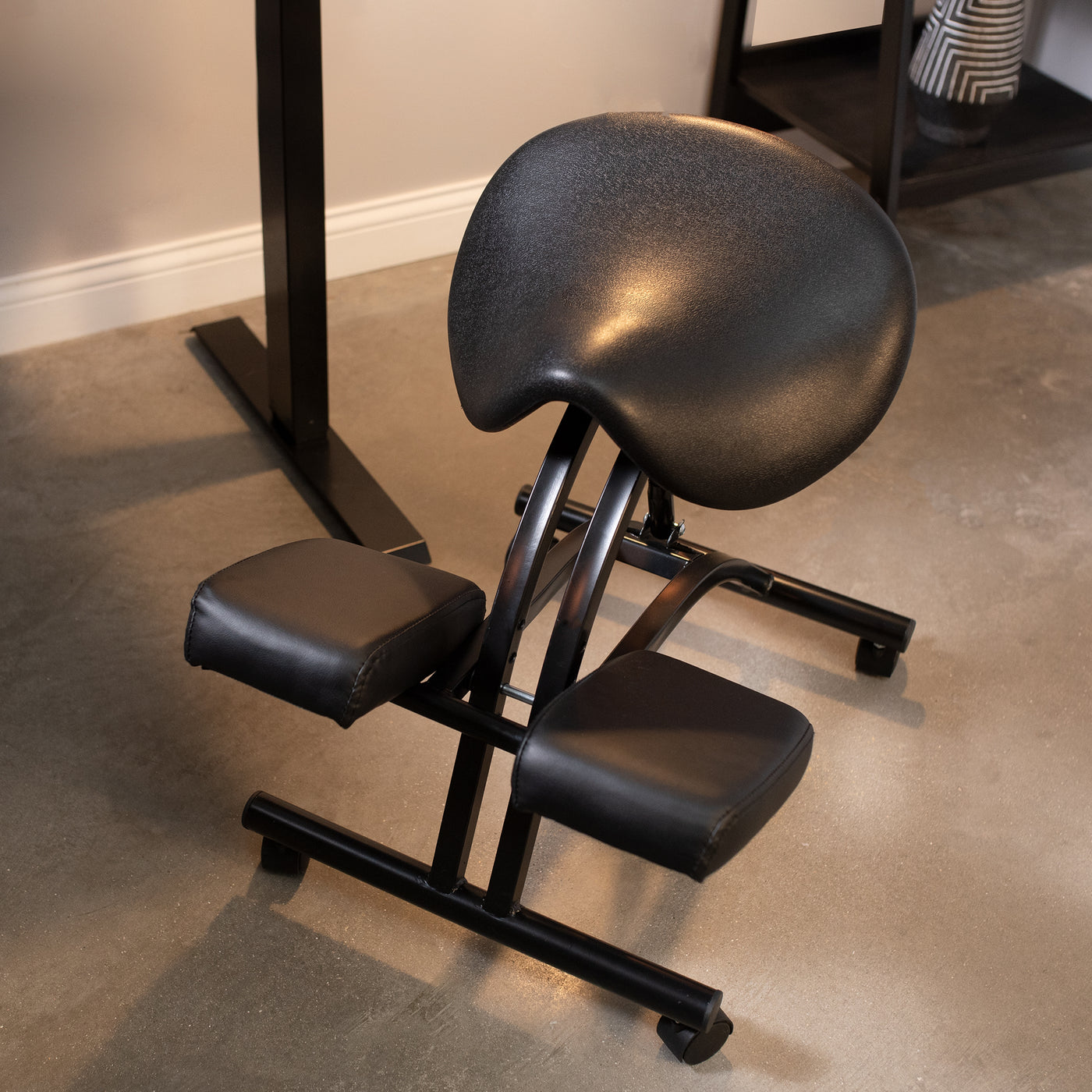 Sturdy saddle seat kneeling chair for tension relief and posture.