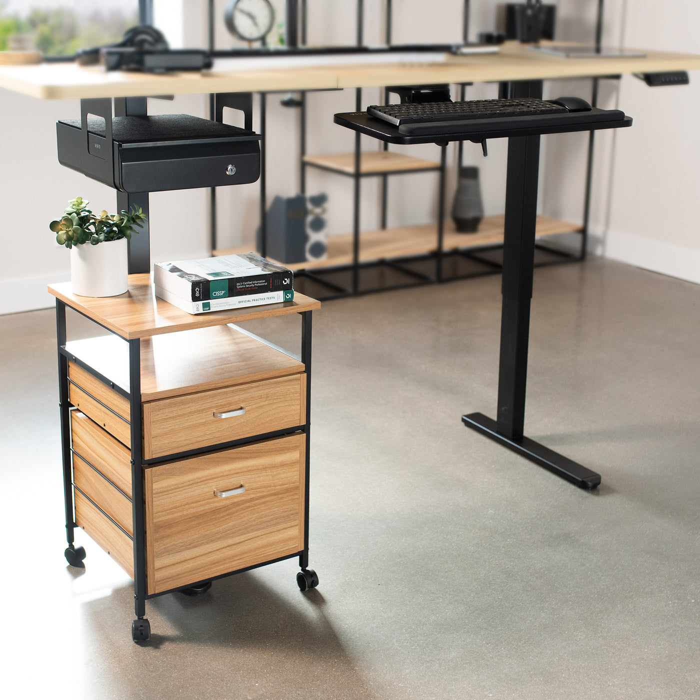 Desk frame with rear set legs saving space and allowing for modern under-desk storage.
