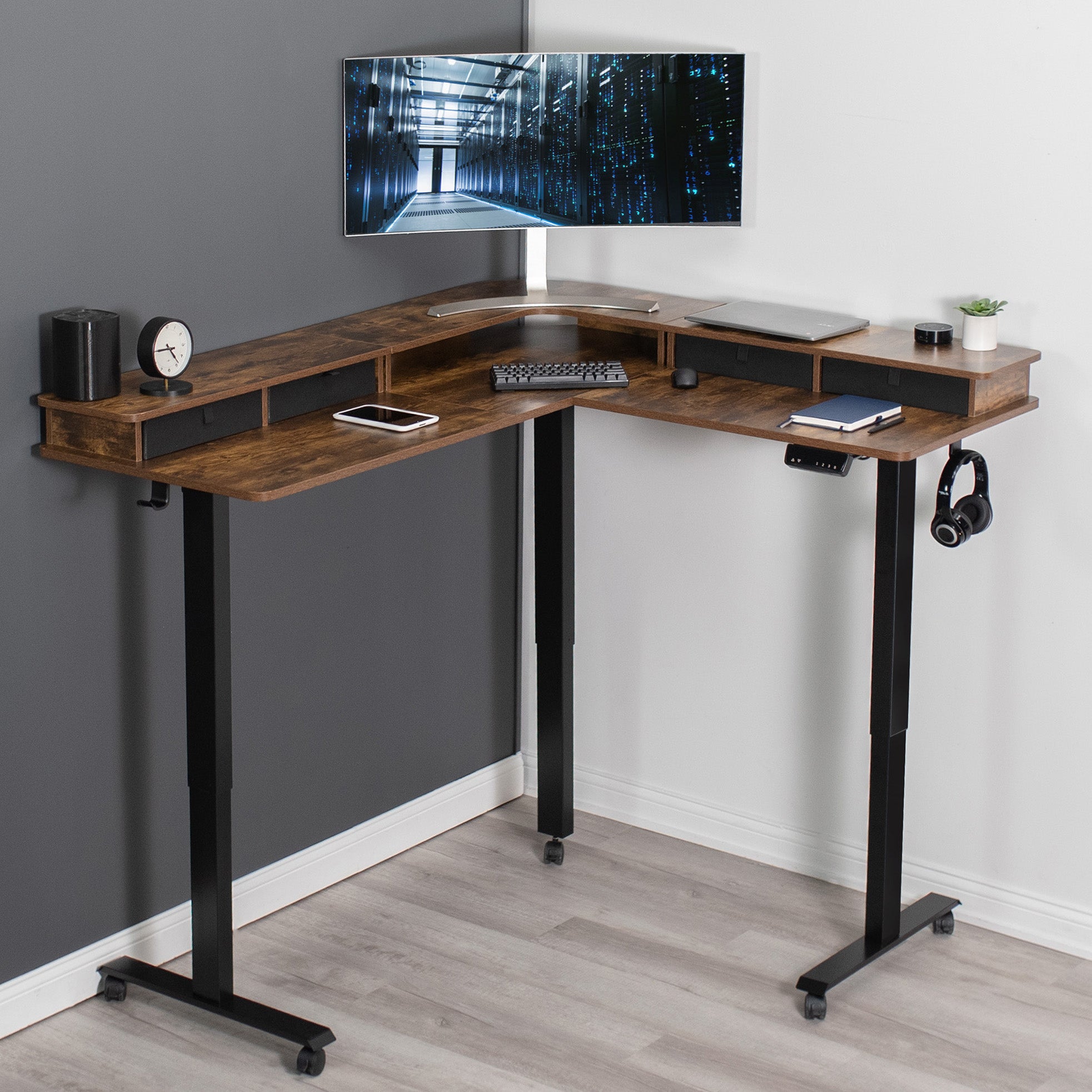 Rustic dual tier height adjustable electric corner desk with storage drawers and wheels.