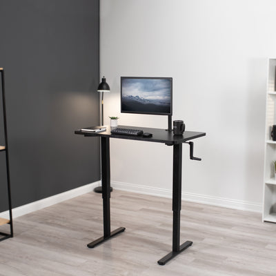 Extended height adjustable desk to work while standing.