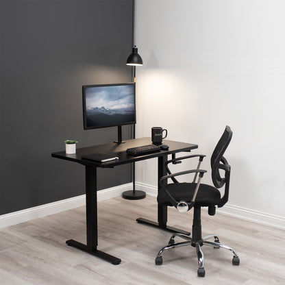 Minimalist office space set up at sitting level.