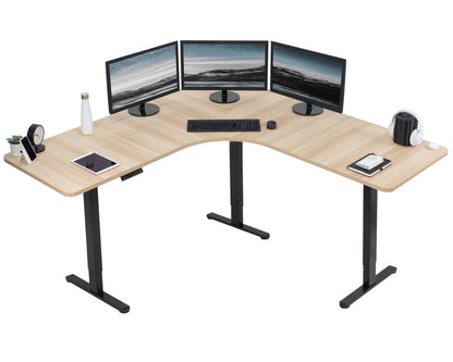 Large heavy-duty electric height adjustable corner desk workstation with programmable memory controller.