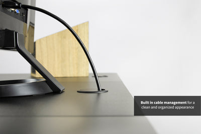 Tabletop with integrated cable management to maintain organized office space.