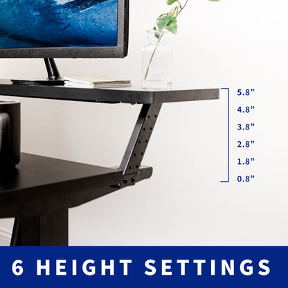 Heavy-duty adjustable sit or stand dual tier ergonomic office desk workstation.