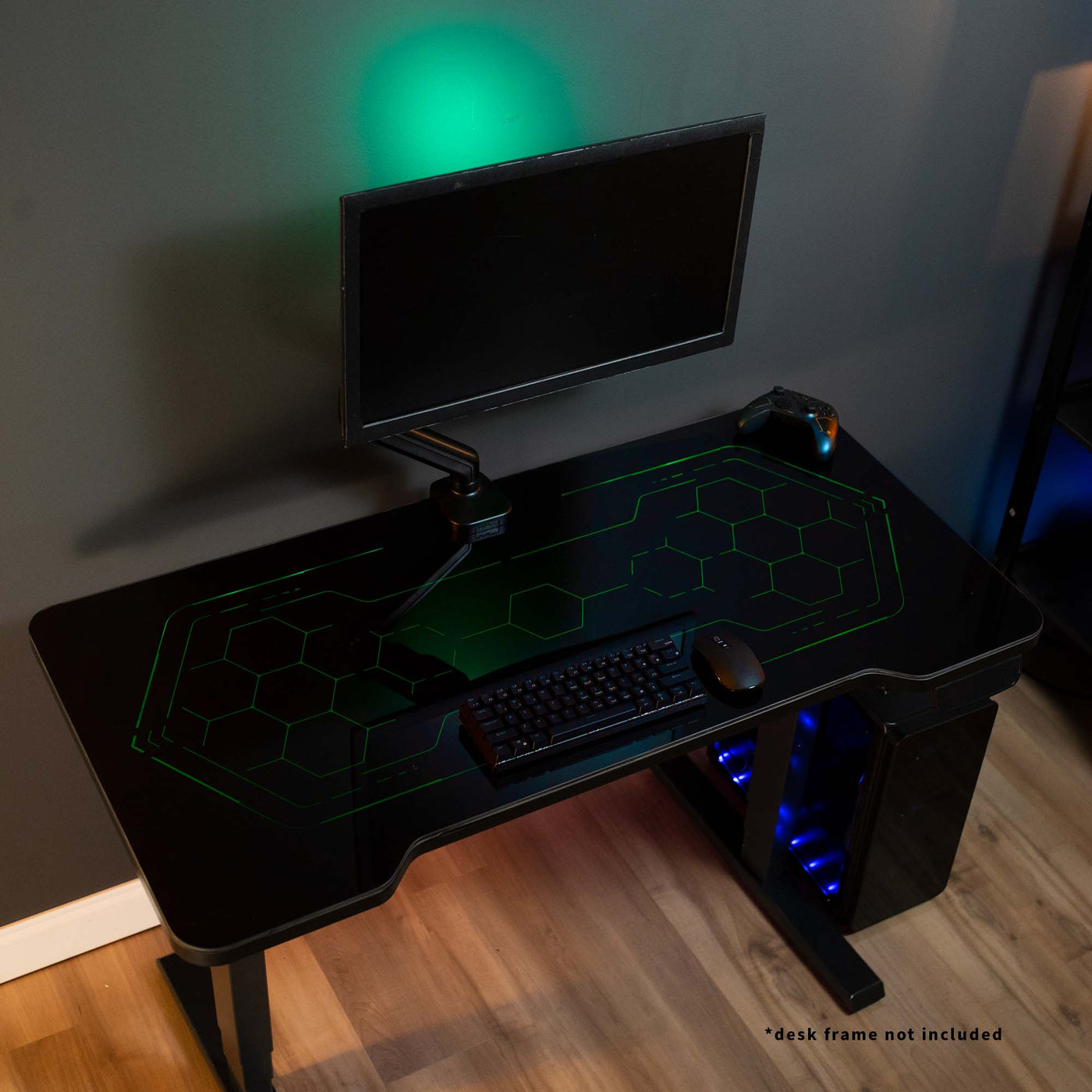 Sturdy RGB lighting gaming tabletop desktop with color changing remote controlled LED lights under tempered glass tabletop surface.
