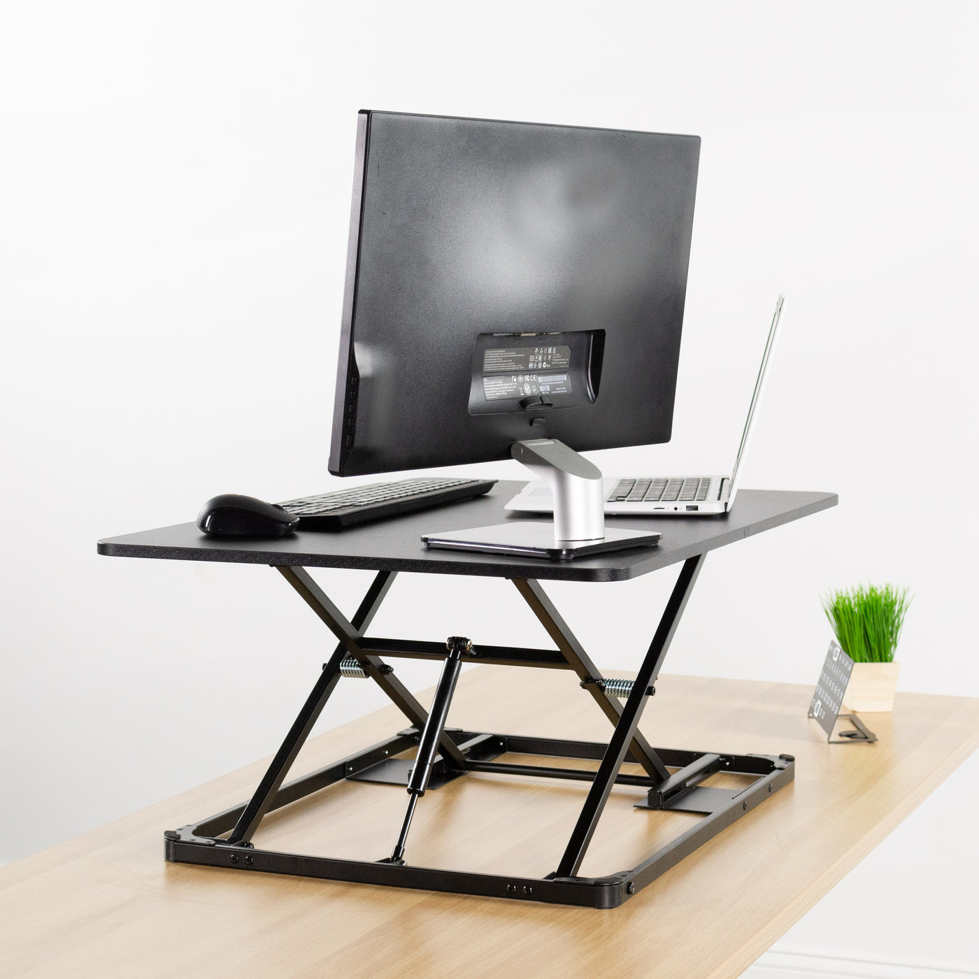 Sturdy height adjustable desk converter monitor riser.
