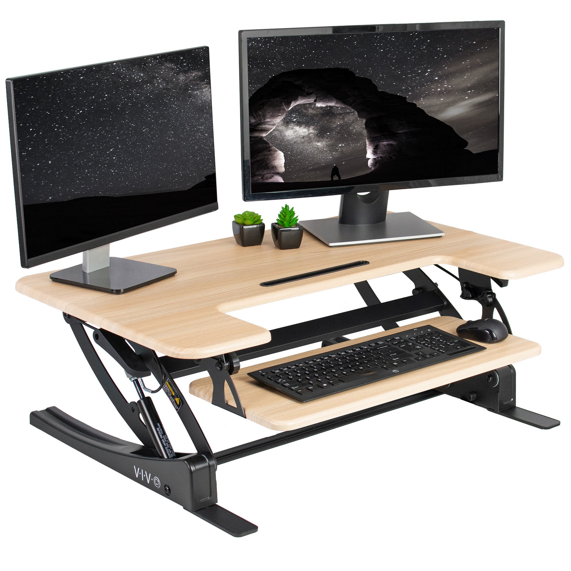 Heavy-duty height adjustable desk converter monitor riser with 2 tiers.