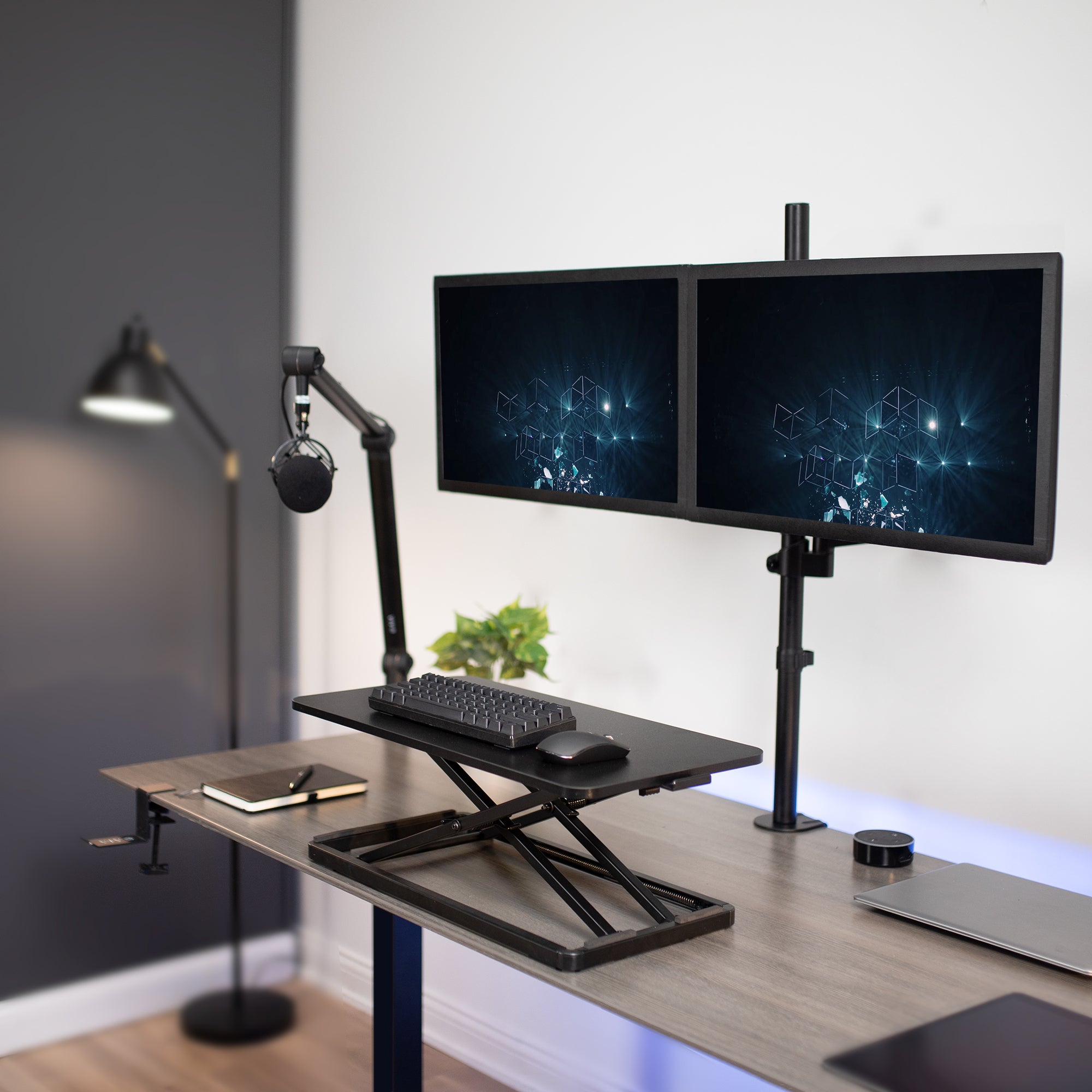 Keyboard and mouse on a keyboard desk riser from VIVO.