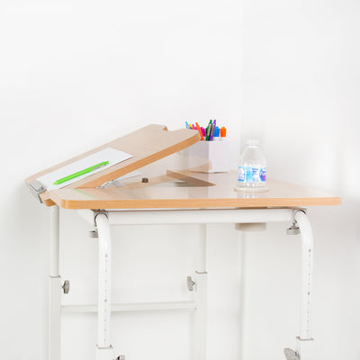 Desk top with built-in articulation for an opptinal easel effect.