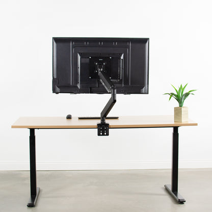 Feature of VESA plate holding large mounted monitor because of increased compatibility.