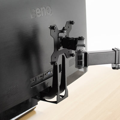 Simply attach the new adapter bracket to the existing VESA face plate of your monitor mount.