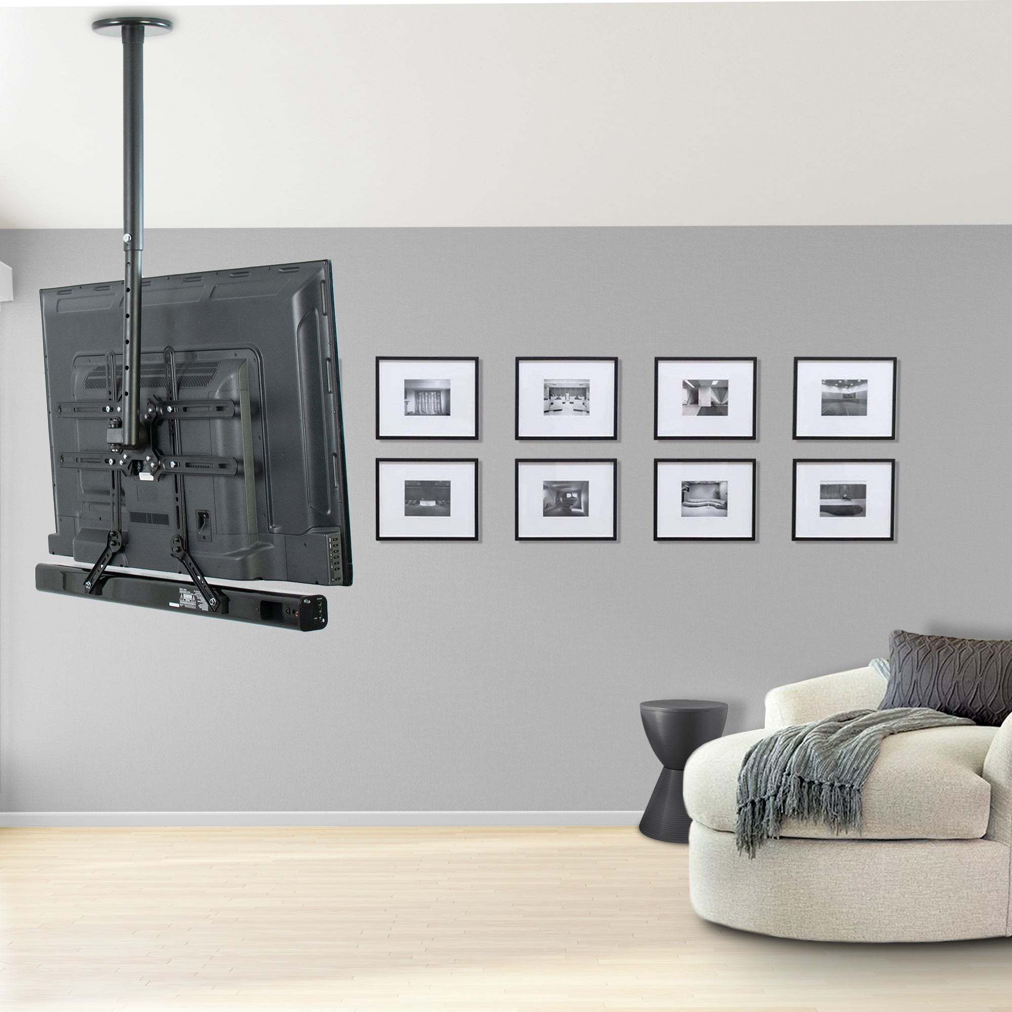 Heavy-duty height adjustable TV ceiling mount and soundbar bracket for enhanced audio speaker system.