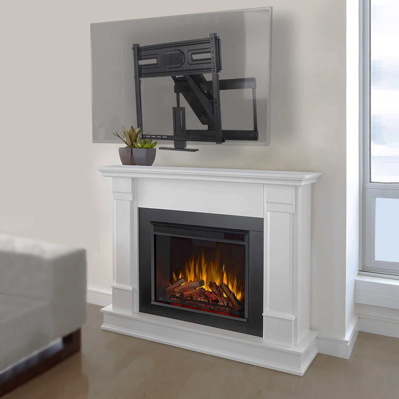 Heavy duty Mechanical Spring TV mount with a large TV screen displayed above a fireplace.