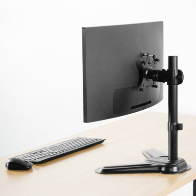 Monitor stand with attachable VESA bracket converter.
