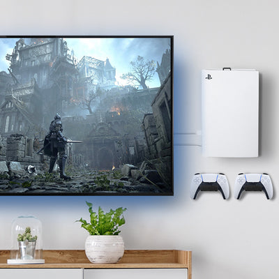 A PS5 gaming station mounted to the wall with a remote.