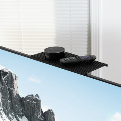 Above the TV shelf supporting an Amazon Home and Roku stick.