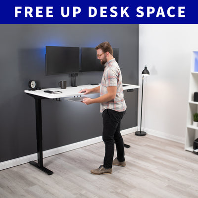 Free up desk space by storing your laptop out of sight under your desk.