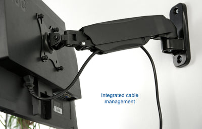 Integrated cable management that maintains an organized workspace through adjustments of a monitor.