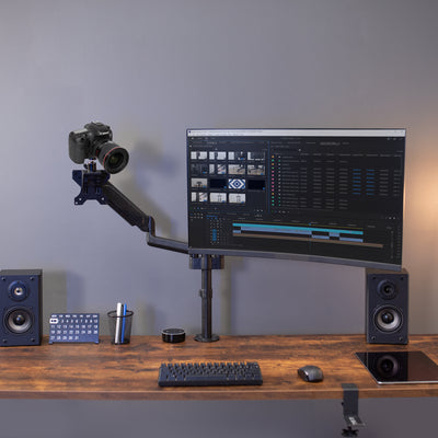 Convenient desktop workstation set up with microphone mount vesa adapter setup.