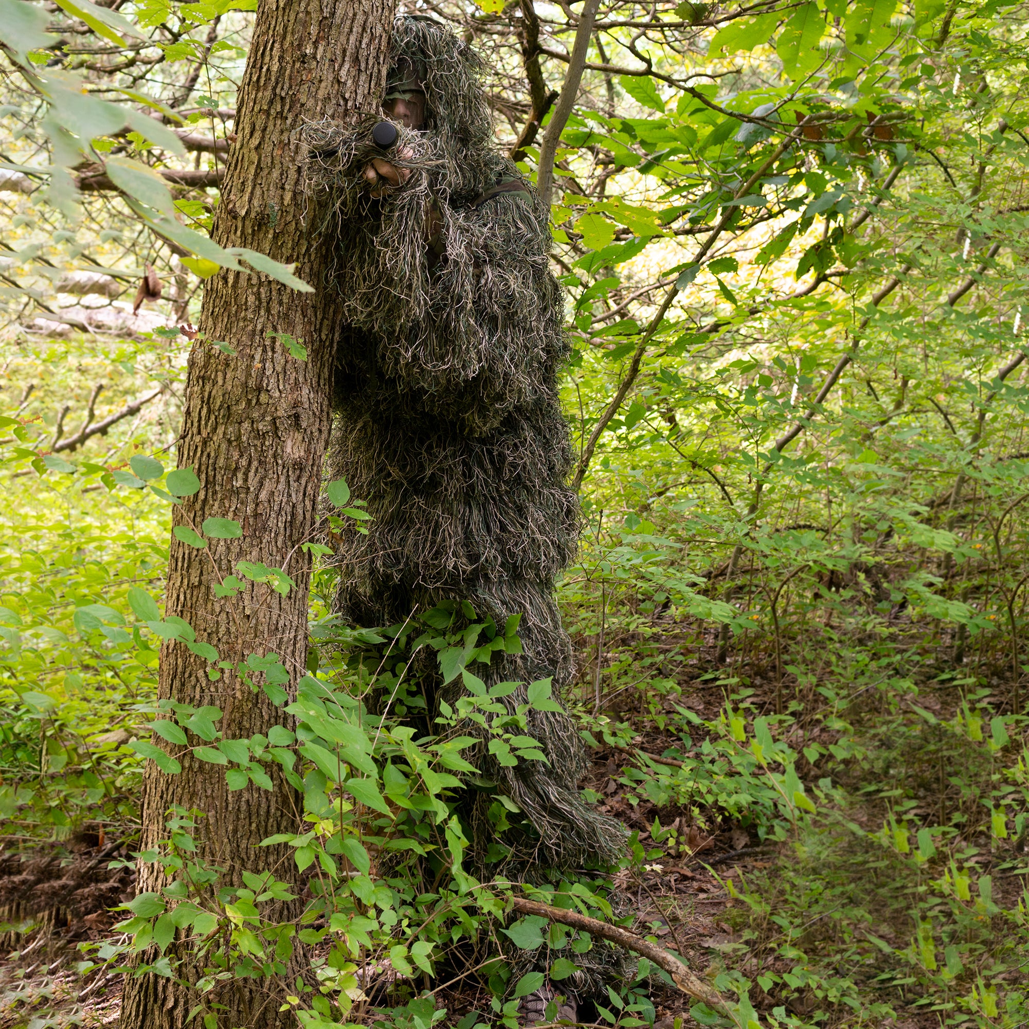 Long moss ghillie suit.