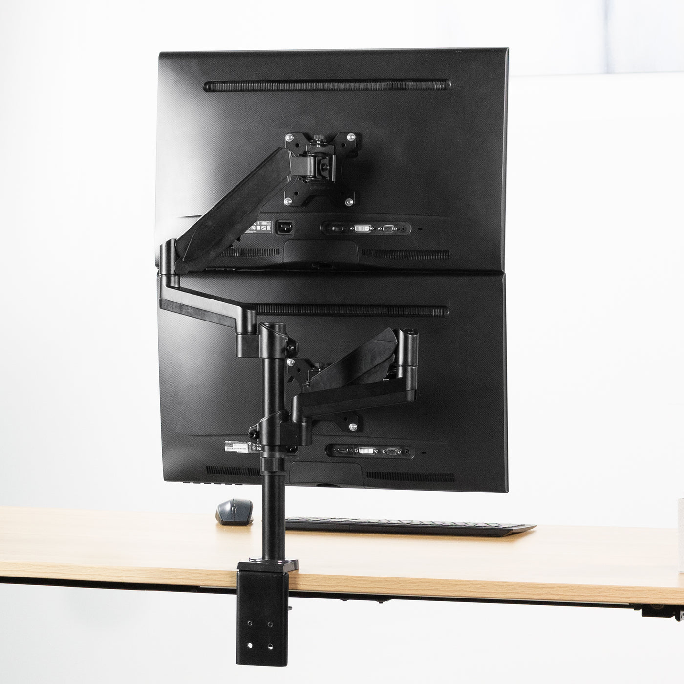 Create a dual monitor setup by adding a pneumatic monitor mount stand.