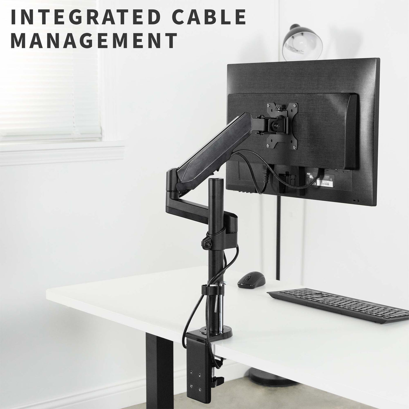 Pneumatic arm with integrated cable management to maintain a visually appealing workspace.