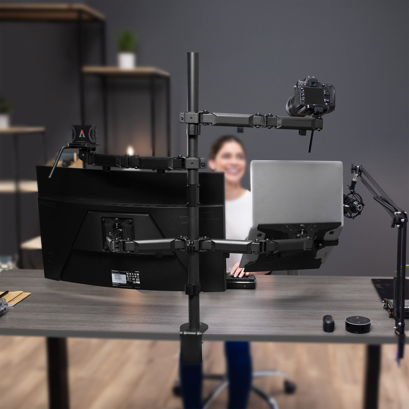 Versatile content clamp on desk mount stand.