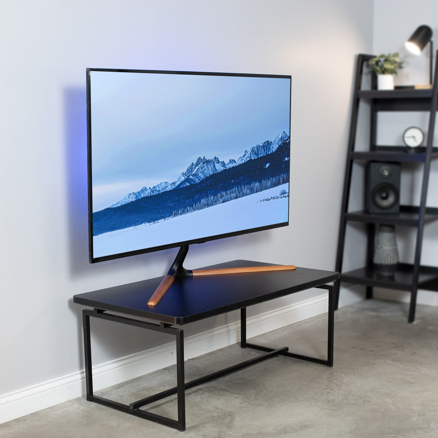 Sturdy height adjustable TV stand.