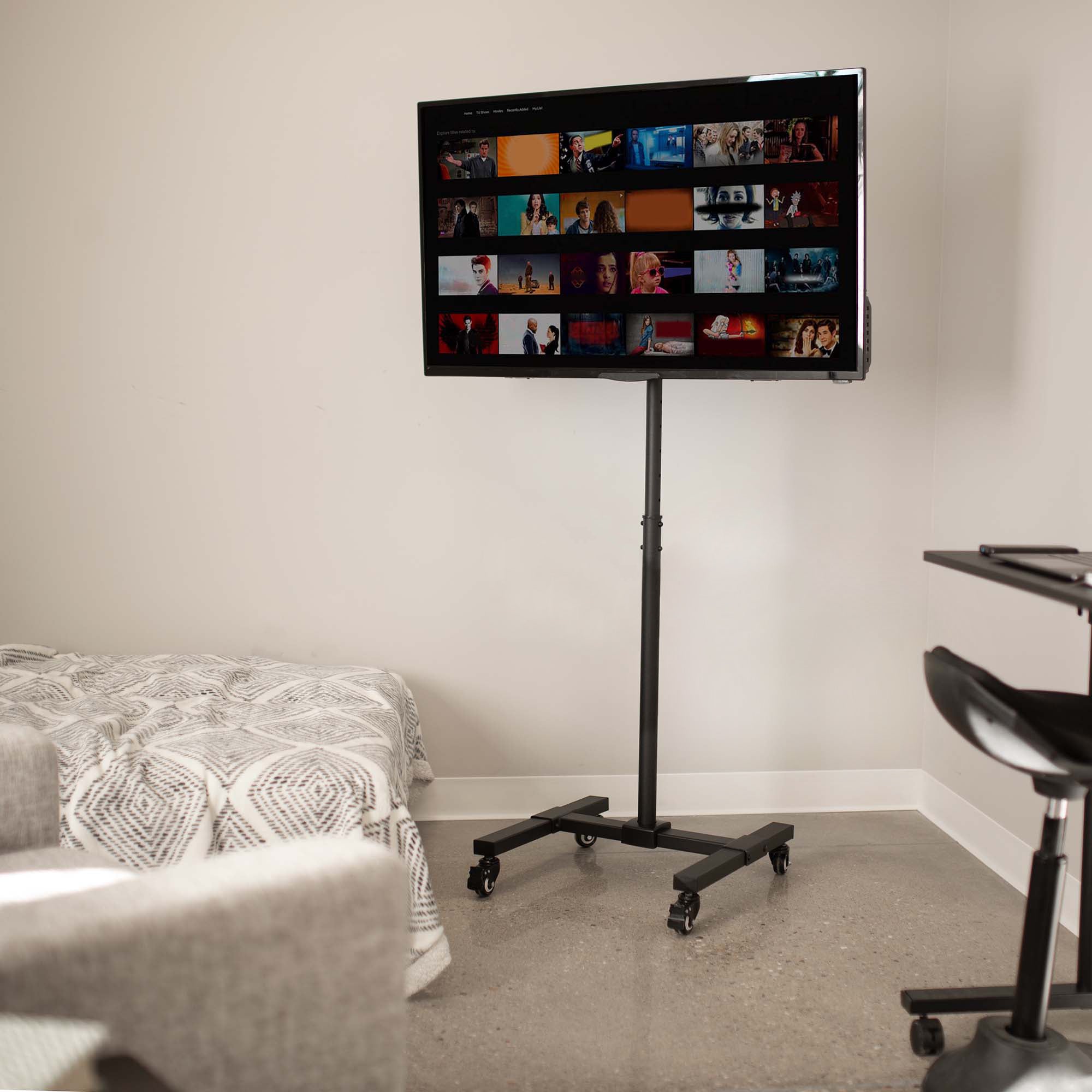 Sturdy mobile height adjustable TV cart with wheels.