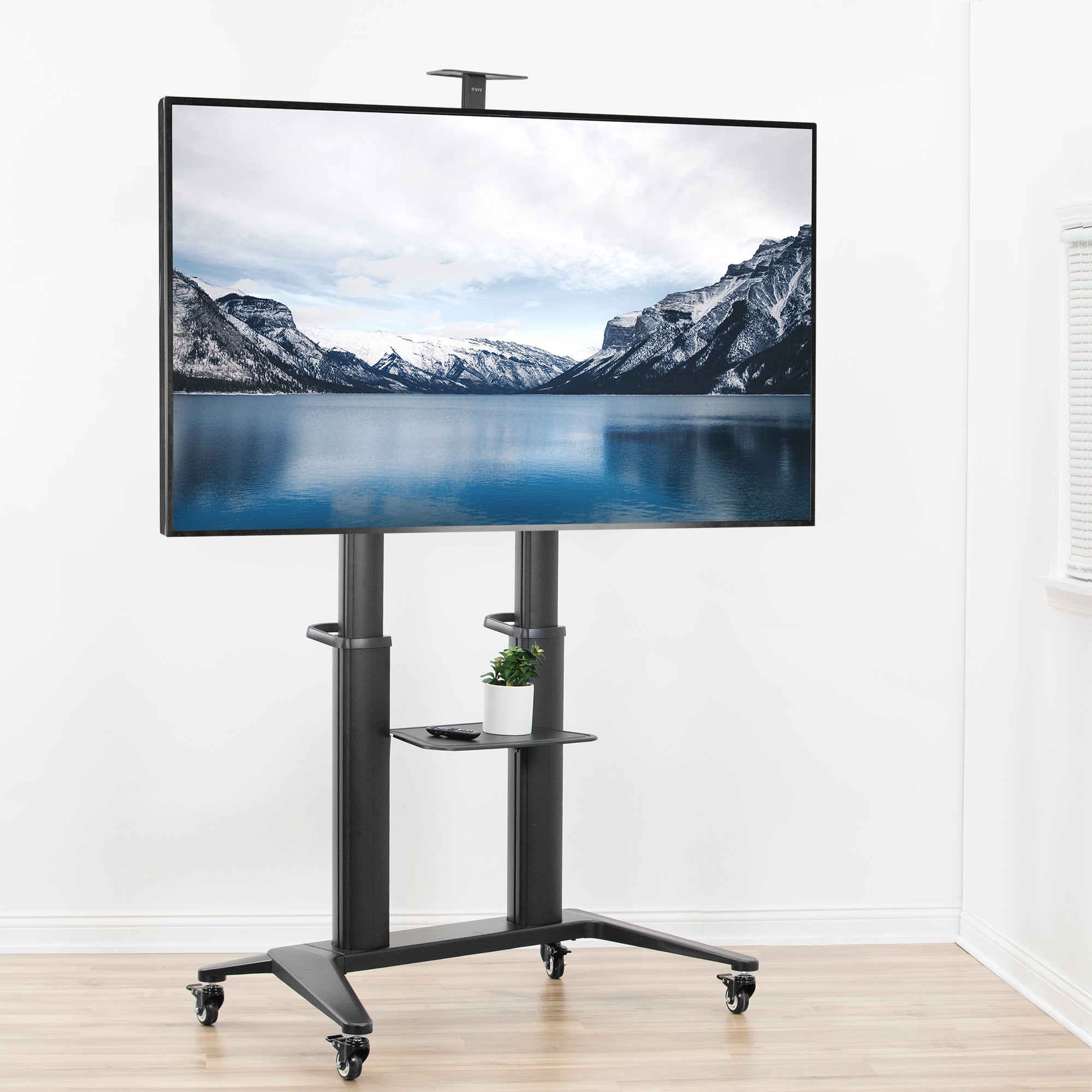 Black dual-shelf mobile TV stand.