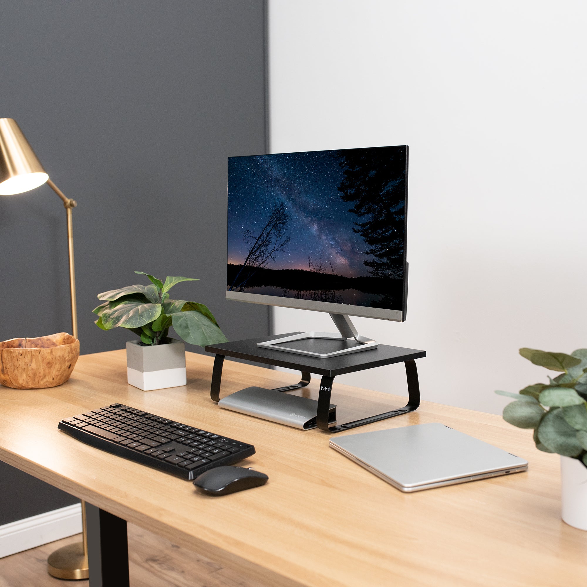 Sturdy tabletop riser for laptop or monitor for comfortable viewing.