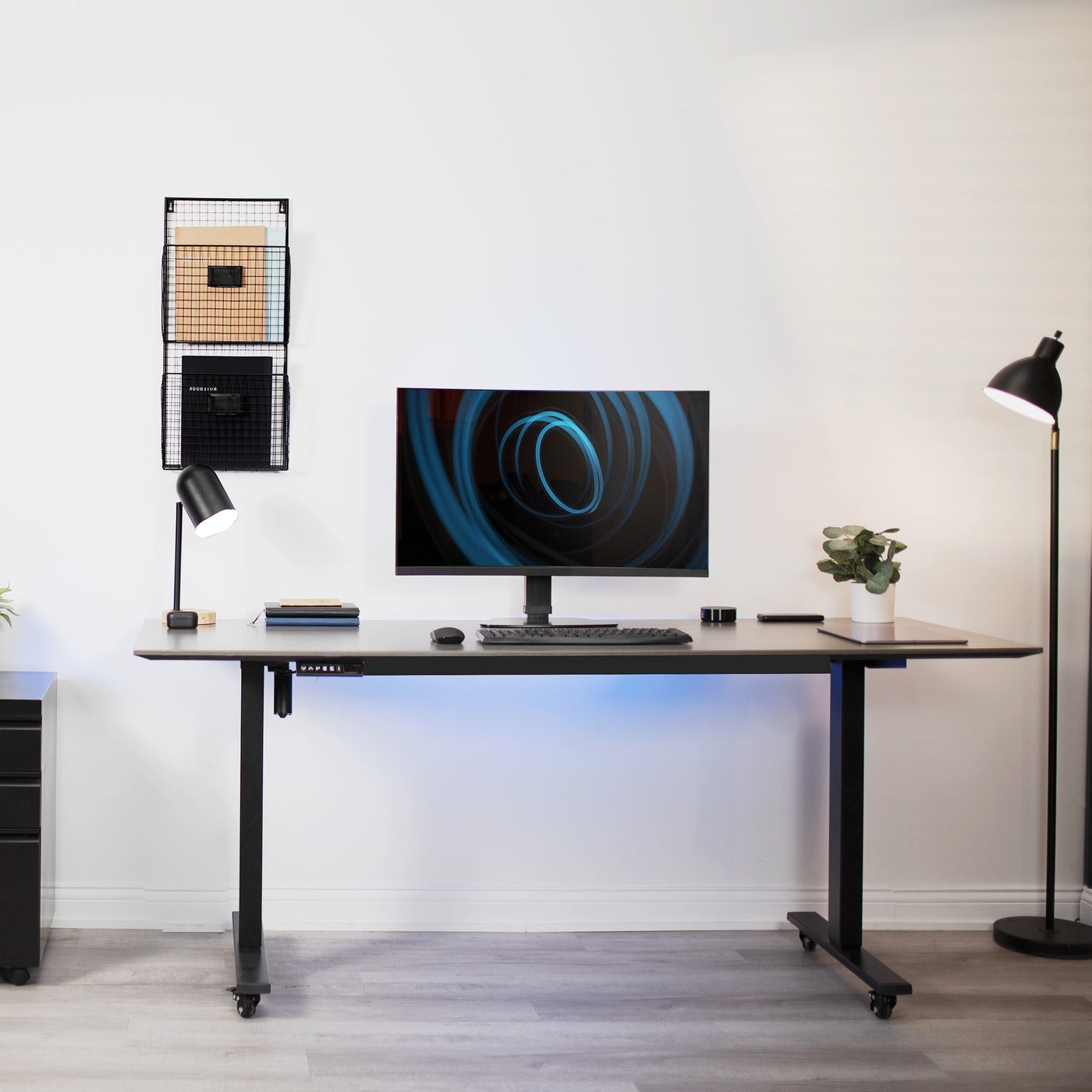 Sturdy adjustable single monitor ergonomic desk stand for office workstation.