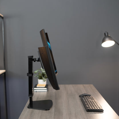 Sturdy adjustable single monitor ergonomic desk stand for office workstation.