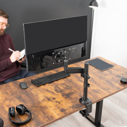 Sturdy adjustable pneumatic arm single monitor ergonomic desk mount for office workstation.