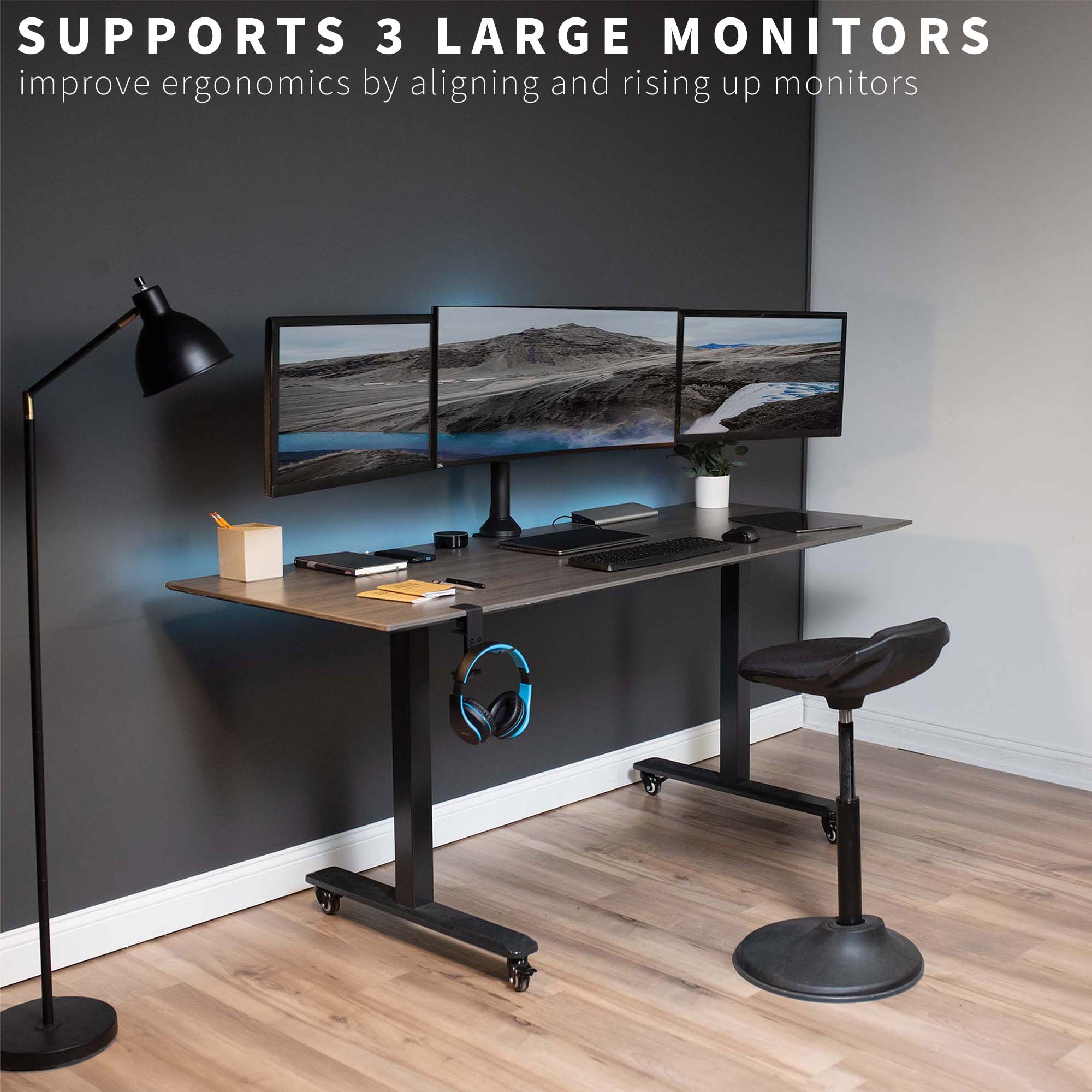 Sturdy height adjustable triple monitor desk mount.