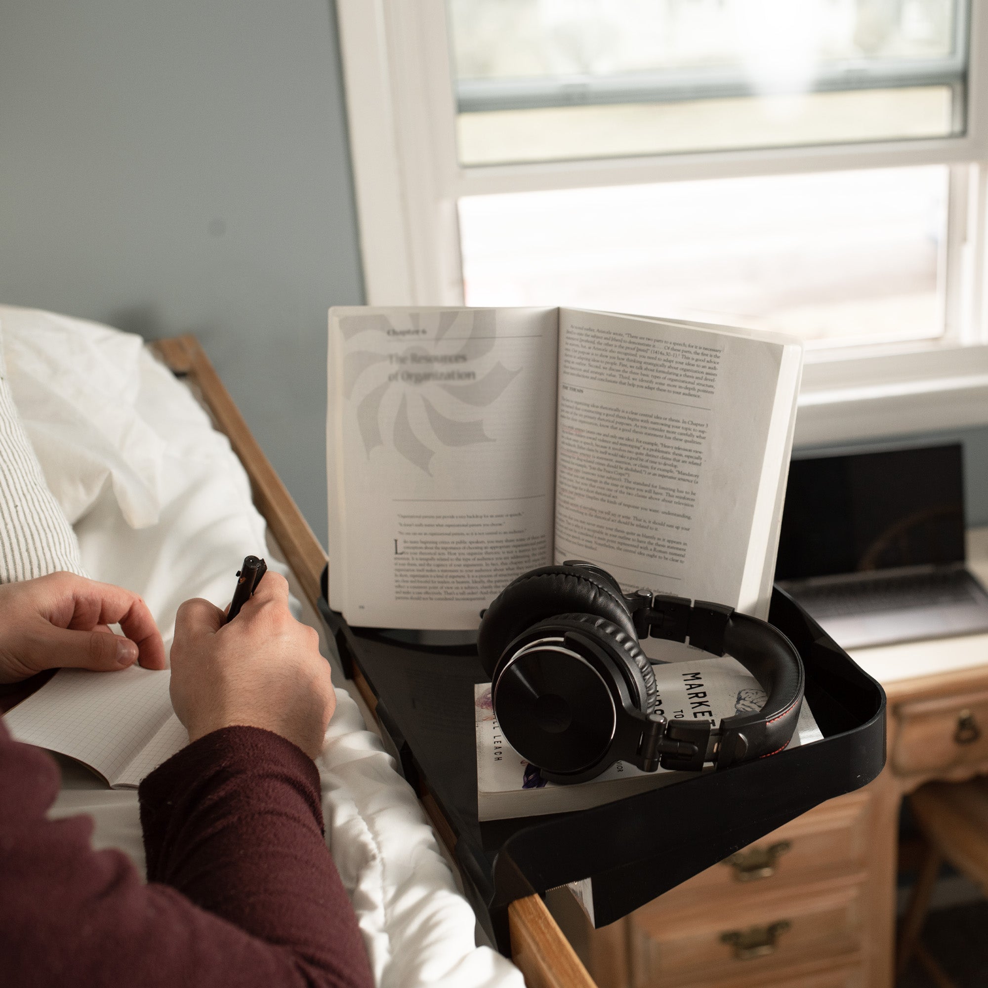 Attachable bedside shelf nightstand tray for storage and organizing.